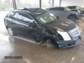 2011 Cadillac SRX Luxury Collection with VIN 3GYFNAEY4BS655011, listed as a IAAI auction lot 41990104 with 133,246 mi miles. Bid and sale history available at carsss.com. Image 1.