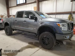 2016 Nissan Titan XD Platinum Reserve with VIN 1N6BA1F44GN503112, listed as a Copart auction lot 81138394 with 143,321 mi miles and Salvage Title. Bid and sale history available at carsss.com. Image 4.