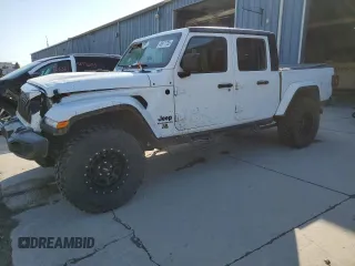 2021 Jeep Gladiator Willys with VIN 1C6HJTAGXML623599, listed as a Copart auction lot 48971735 with 35,052 mi miles and Salvage Title. Bid and sale history available at carsss.com. Image 1.