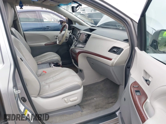 2012 Toyota Sienna XLE with VIN 5TDDK3DC7CS037579, listed as a IAAI auction lot 41080620 with 158,843 mi miles. Bid and sale history available at carsss.com. Image 5.