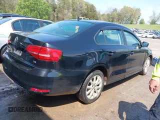 2015 Volkswagen Jetta Sedan 1.8T SE with VIN 3VWD17AJ6FM285921, listed as a IAAI auction lot 42005164 with 173,028 mi miles. Bid and sale history available at carsss.com. Image 4.