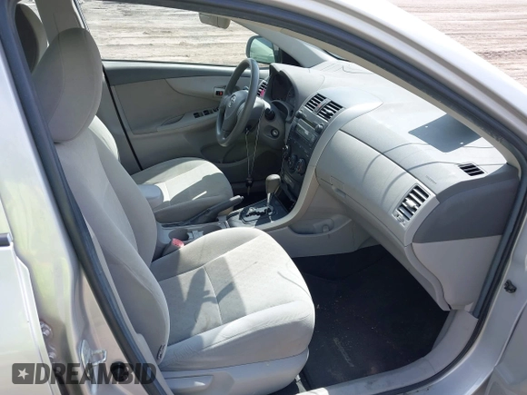 2009 Toyota Corolla with VIN 1NXBU40E49Z017630, listed as a IAAI auction lot 42204714 with 176,828 mi miles. Bid and sale history available at carsss.com. Image 5.