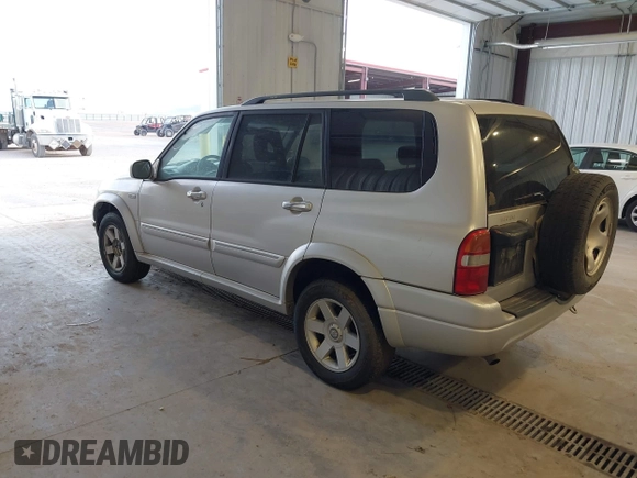 2003 Suzuki XL7 Touring z VIN JS3TX92V434101918, wystawiony jako IAAI lot #42750098 z przebiegiem 261 451 mil mil oraz . Historia ofert i sprzedaży dostępna na DreamBid. Obrazek 3.