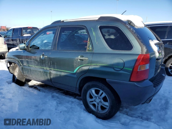 2005 Kia Sportage LX with VIN KNDJE723957107441, listed as a Copart auction lot 41530635 with 146,045 mi miles and Salvage Title. Bid and sale history available at carsss.com. Image 2.
