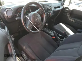 2013 Jeep Wrangler Sport с VIN 1C4AJWAG2DL649500, выставлен на аукционе Copart как лот 52859775 с пробегом 70 254 миль миль и Списание • Salvage title. История ставок и продаж доступна на DreamBid. Изображение 8.