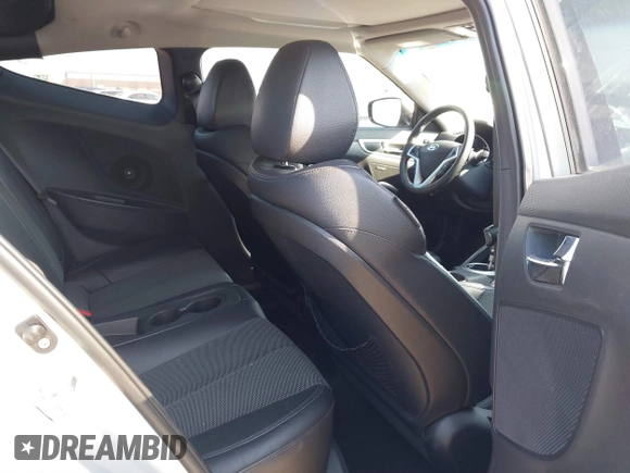 2012 Hyundai Veloster w/Black Int with VIN KMHTC6AD7CU063968, listed as a IAAI auction lot 41764263 with 83,634 mi miles and . Bid and sale history available at DreamBid. Image 8.