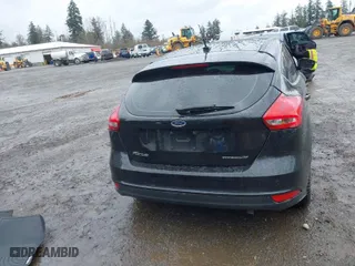 2015 Ford Focus Titanium with VIN 1FADP3N2XFL300859, listed as a IAAI auction lot 41944410 with 76,194 mi miles. Bid and sale history available at carsss.com. Image 17.