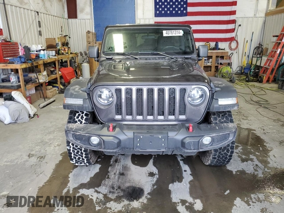 2021 Jeep Wrangler Unlimited Rubicon with VIN 1C4HJXFNXMW732523, listed as a Copart auction lot 40781314 with 23,535 mi miles and Salvage title. Bid and sale history available at DreamBid. Image 5.