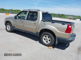 2003 Ford Explorer Sport Trac XLS with VIN 1FMZU77E83UA65631, listed as a IAAI auction lot 42133011 with 112,112 mi miles and . Bid and sale history available at DreamBid. Image 3.