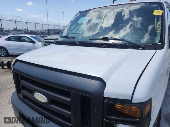 2014 Ford Econoline Cargo Commercial with VIN 1FTNE1EW3EDA67962, listed as a IAAI auction lot 42737706 with 108,158 mi miles and . Bid and sale history available at DreamBid. Image 2.