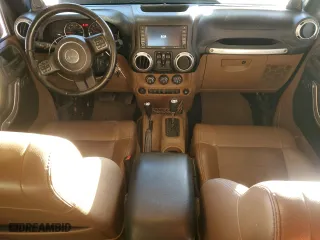 2011 Jeep Wrangler Unlimited Sahara with VIN 1J4BA5H13BL544178, listed as a Copart auction lot 85292354 with 188,892 mi miles and Salvage Title. Bid and sale history available at carsss.com. Image 8.