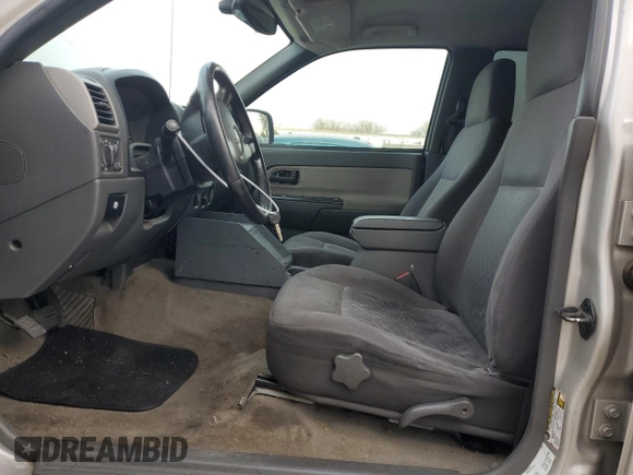 2005 GMC Canyon 1SF SLE Z71 z VIN 1GTDT136658154932, wystawiony jako Copart lot #85556344 z przebiegiem 180 129 mil mil oraz Szkody całkowita. Historia ofert i sprzedaży dostępna na DreamBid. Obrazek 7.