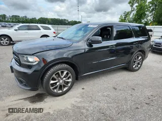 2014 Dodge Durango R/T z VIN 1C4SDJCT4EC318556, wystawiony jako Copart lot #60149025 z przebiegiem 184 114 mil mil oraz Szkoda całkowita • Salvage title. Historia ofert i sprzedaży dostępna na DreamBid. Obrazek 1.