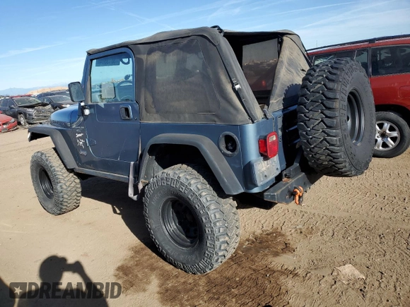 1998 Jeep Wrangler Sport with VIN 1J4FY19S2WP719595, listed as a Copart auction lot 73013584 with 190,056 mi miles and Salvage Title. Bid and sale history available at carsss.com. Image 2.