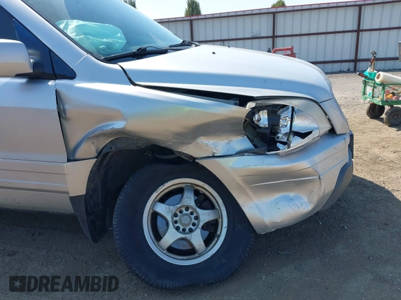 2004 Honda Pilot EX with VIN 2HKYF18434H501925, listed as a IAAI auction lot 42115835 with 271,091 mi miles and . Bid and sale history available at DreamBid. Image 6.
