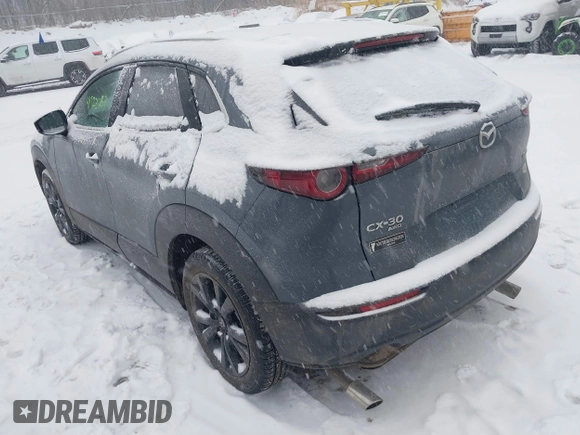 2023 Mazda CX-30 S Preferred z VIN 3MVDMBCM4PM574509, wystawiony jako IAAI lot #41522283 z przebiegiem 21 507 mil mil oraz . Historia ofert i sprzedaży dostępna na DreamBid. Obrazek 3.