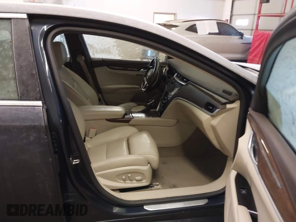 2013 Cadillac XTS Luxury with VIN 2G61P5S34D9200849, listed as a IAAI auction lot 41412189 with 134,932 mi miles. Bid and sale history available at carsss.com. Image 5.
