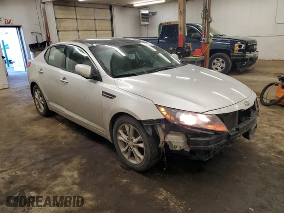 2012 Kia Optima EX with VIN 5XXGN4A67CG061858, listed as a Copart auction lot 43562795 with 168,789 mi miles and Salvage Title. Bid and sale history available at carsss.com. Image 4.