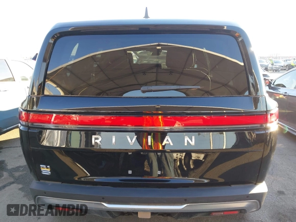 2024 Rivian R1S Adventure with VIN 7PDSGABAXRN034598, listed as a IAAI auction lot 41312180 with 23,615 mi miles. Bid and sale history available at carsss.com. Image 17.