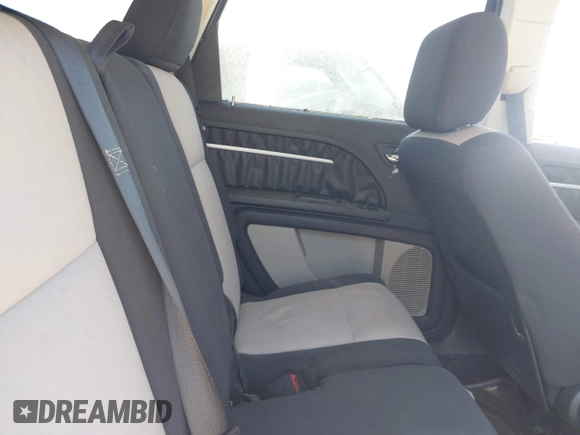 2009 Dodge Journey SXT with VIN 3D4GG57VX9T200489, listed as a IAAI auction lot 42048965 with 156,830 mi miles. Bid and sale history available at carsss.com. Image 8.