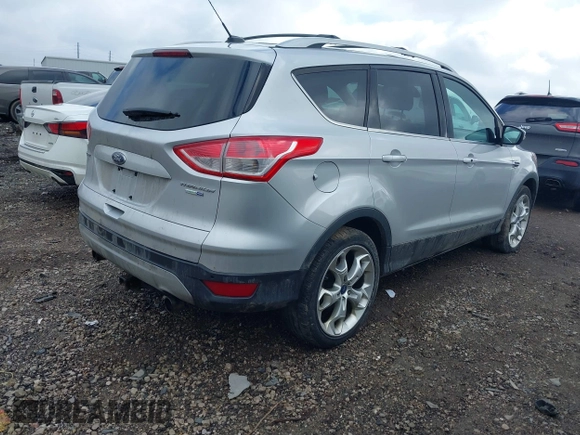 2013 Ford Escape Titanium with VIN 1FMCU9J90DUC22888, listed as a IAAI auction lot 41664550 with 185,568 mi miles and . Bid and sale history available at DreamBid. Image 4.