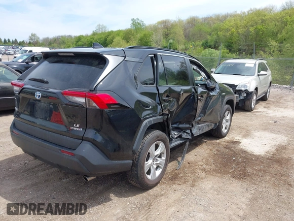 2021 Toyota RAV4 Hybrid LE with VIN 2T3L6RFV7MW011159, listed as a IAAI auction lot 42212998 with 104,626 mi miles and . Bid and sale history available at DreamBid. Image 4.