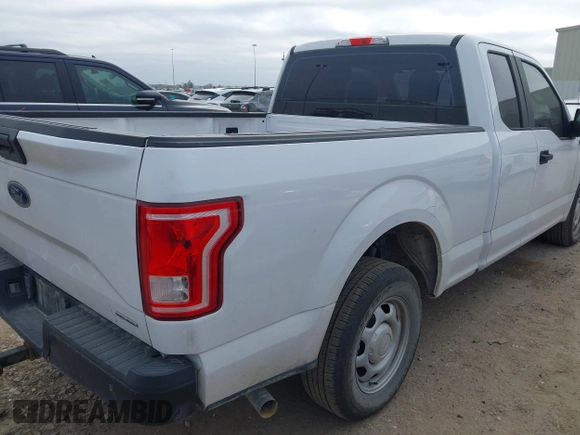 2015 Ford F-150 XL with VIN 1FTEX1CF9FKE89616, listed as a IAAI auction lot 41535973 with 212,364 mi miles. Bid and sale history available at carsss.com. Image 4.