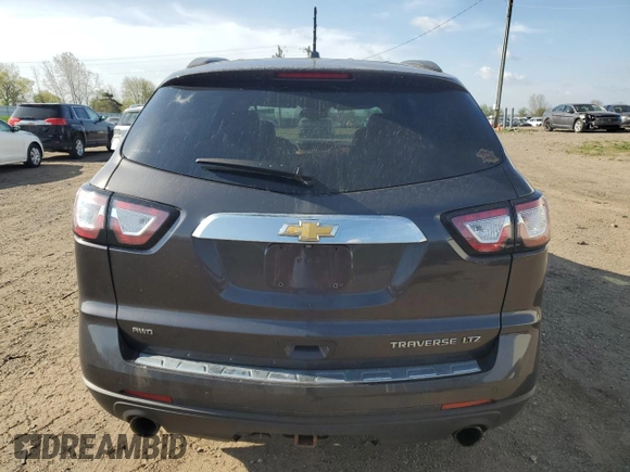 2014 Chevrolet Traverse LTZ z VIN 1GNKVJKD5EJ212952, wystawiony jako Copart lot #54815805 z przebiegiem 185 329 mil mil oraz Czysty tytuł • Clean title. Historia ofert i sprzedaży dostępna na DreamBid. Obrazek 6.