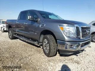 2016 Nissan Titan XD PRO-4X with VIN 1N6BA1F44GN517947, listed as a Copart auction lot 75524654 with 79,016 mi miles and Salvage Title. Bid and sale history available at carsss.com. Image 4.