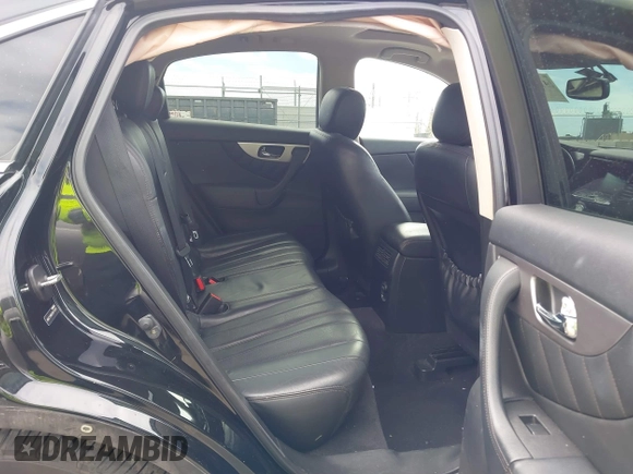 2014 Infiniti QX70 z VIN JN8CS1MW6EM410091, wystawiony jako IAAI lot #41896327 z przebiegiem 139 021 mil mil oraz . Historia ofert i sprzedaży dostępna na DreamBid. Obrazek 8.