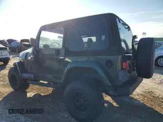 1997 Jeep Wrangler Sahara with VIN 1J4FY49S2VP542031, listed as a Copart auction lot 42509765 with 136,689 mi miles and Salvage Title. Bid and sale history available at carsss.com. Image 2.