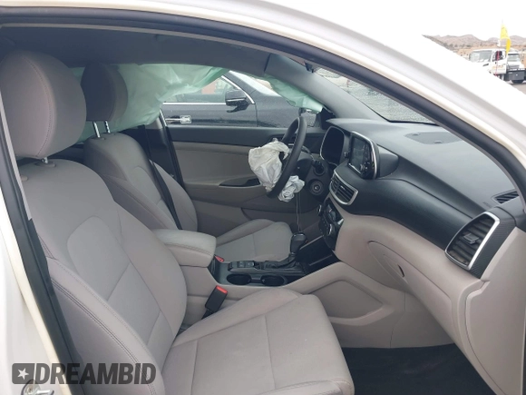 2019 Hyundai Tucson SE with VIN KM8J23A48KU026984, listed as a IAAI auction lot 41767118 with 72,647 mi miles. Bid and sale history available at carsss.com. Image 5.