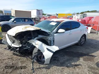 2015 Kia Optima LX with VIN 5XXGM4A75FG386704, listed as a IAAI auction lot 41344996 with 266,993 mi miles and . Bid and sale history available at DreamBid. Image 16.