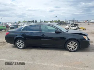 2009 Toyota Avalon XL with VIN 4T1BK36B79U327316, listed as a IAAI auction lot 42130918 with 184,948 mi miles. Bid and sale history available at carsss.com. Image 13.