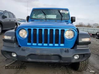 2021 Jeep Wrangler Sport S with VIN 1C4GJXAG2MW762104, listed as a Copart auction lot 46620845 with 56,799 mi miles and Salvage Title. Bid and sale history available at DreamBid. Image 5.