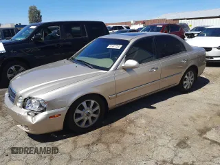 2005 Kia Optima LX z VIN KNAGD128855434945, wystawiony jako Copart lot #49397724 z przebiegiem 97 437 mil mil oraz Szkoda całkowita • Salvage title. Historia ofert i sprzedaży dostępna na DreamBid. Obrazek 1.