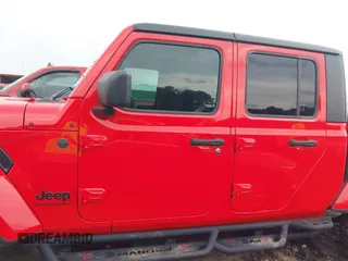 2023 Jeep Gladiator Sport S z VIN 1C6HJTAG4PL544871, wystawiony jako IAAI lot #42382428 z przebiegiem 33 453 mil mil oraz . Historia ofert i sprzedaży dostępna na DreamBid. Obrazek 14.