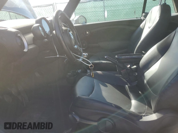 2011 MINI Convertible with VIN WMWZN3C57BTZ89544, listed as a Copart auction lot 80065204 with Not provided miles and Salvage title. Bid and sale history available at DreamBid. Image 7.