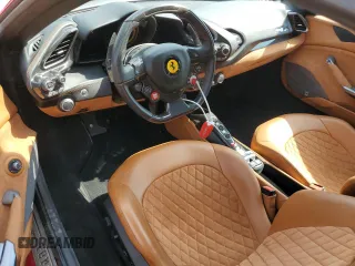 2019 Ferrari 488 z VIN ZFF80AMA4K0238692, wystawiony jako Copart lot #72172804 z przebiegiem Nie podano mil oraz Szkody całkowita. Historia ofert i sprzedaży dostępna na DreamBid. Obrazek 8.