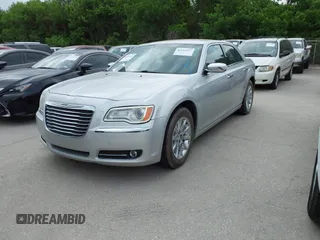 2012 Chrysler 300 Limited with VIN 2C3CCACG9CH223032, listed as a IAAI auction lot 42144147 with 139,625 mi miles. Bid and sale history available at carsss.com. Image 2.