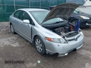 2006 Honda Civic LX z VIN 1HGFA16596L032275, wystawiony jako IAAI lot #42184178 z przebiegiem 220 657 mil mil oraz . Historia ofert i sprzedaży dostępna na DreamBid. Obrazek 1.