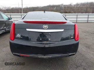 2014 Cadillac XTS Platinum with VIN 2G61W5S84E9291640, listed as a IAAI auction lot 41877867 with 100,462 mi miles and . Bid and sale history available at DreamBid. Image 16.
