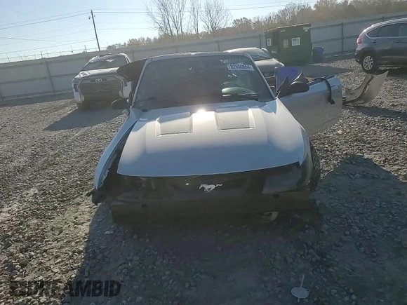 2004 Ford Mustang GT Deluxe z VIN 1FAFP45X64F201980, wystawiony jako Copart lot #82650864 z przebiegiem Nie podano mil oraz Szkoda całkowita • Salvage title. Historia ofert i sprzedaży dostępna na DreamBid. Obrazek 11.