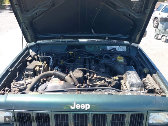 1999 Jeep Cherokee Sport with VIN 1J4FF68S0XL640066, listed as a IAAI auction lot 42768166 with 196,290 mi miles and . Bid and sale history available at DreamBid. Image 10.