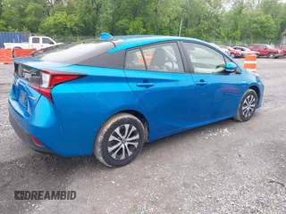 2020 Toyota Prius LE with VIN JTDL9RFU1L3017703, listed as a IAAI auction lot 42277379 with 25,593 mi miles and . Bid and sale history available at DreamBid. Image 4.