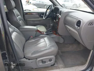 2004 GMC Envoy SLT с VIN 1GKET16S646158071, выставлен на аукционе IAAI как лот 41827351 с пробегом 215 885 миль миль и . История ставок и продаж доступна на DreamBid. Изображение 5.