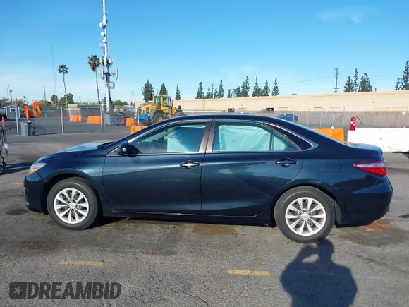 2015 Toyota Camry XLE with VIN 4T4BF1FK4FR512658, listed as a IAAI auction lot 41419793 with 91,741 mi miles. Bid and sale history available at carsss.com. Image 14.