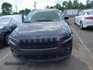 2023 Jeep Cherokee Altitude Lux with VIN 1C4PJMMB0PD115067, listed as a IAAI auction lot 42173993 with 52,180 mi miles. Bid and sale history available at carsss.com. Image 12.