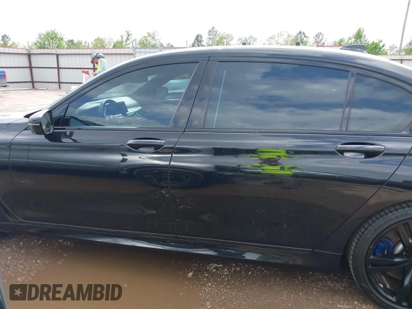 2017 BMW 7 Series 750i with VIN WBA7F0C55HGM21460, listed as a IAAI auction lot 41934198 with 58,206 mi miles and . Bid and sale history available at DreamBid. Image 14.