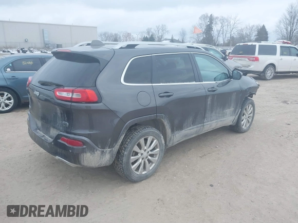 2018 Jeep Cherokee Overland with VIN 1C4PJMJX5JD594240, listed as a IAAI auction lot 41285832 with 130,334 mi miles. Bid and sale history available at carsss.com. Image 4.